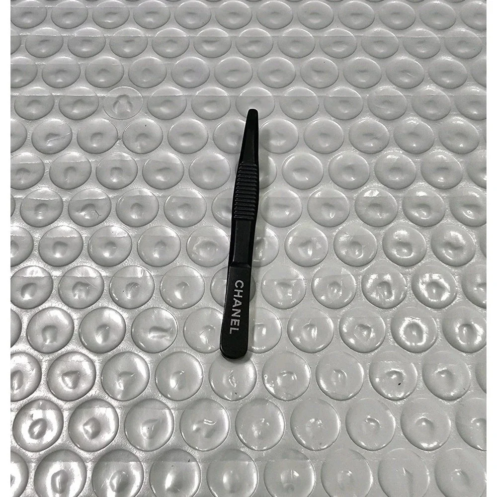CHANEL Black Slanted Tip Tweezers, Textured Grip, 2 in Metal
